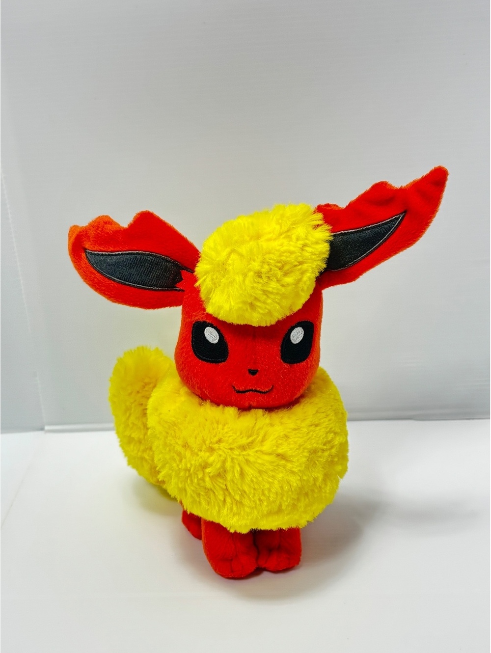Tomy Pokémon Flareon Plush Toy - Soft Stuffed Animal, Approx. 10 Inches Tall